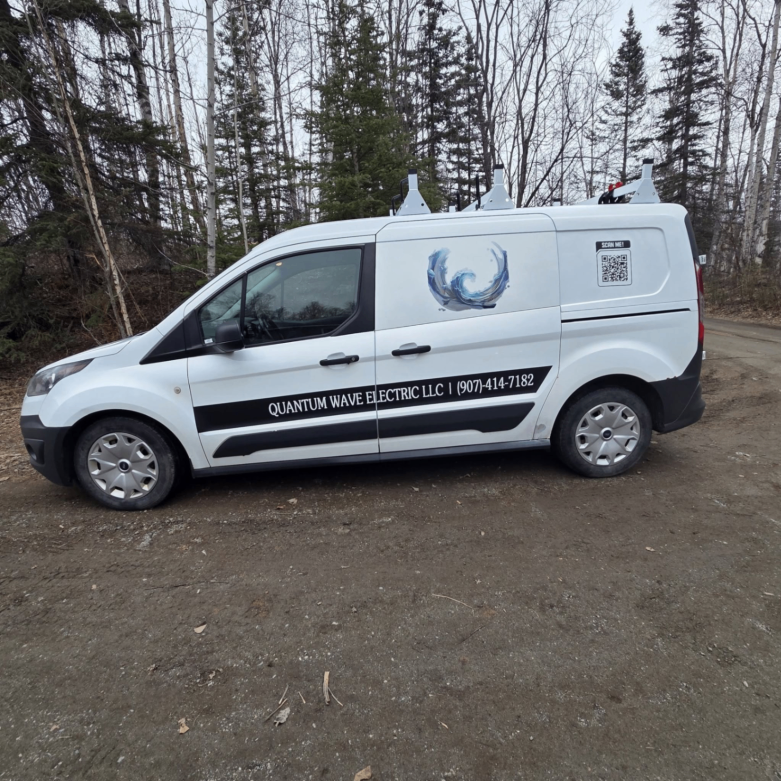 Quantum Wave Electric work van on an Alaska job site